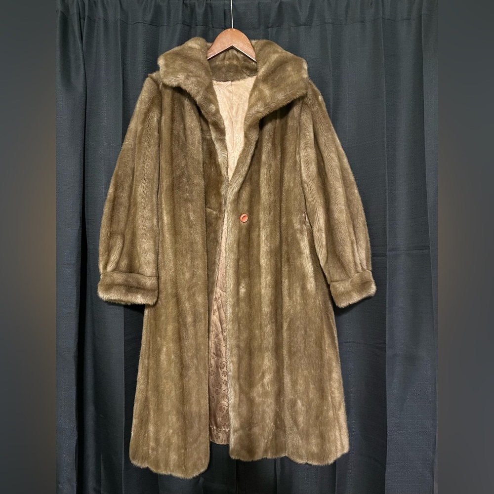 Faux fur, long coat. No blemishes and in perfect condition.